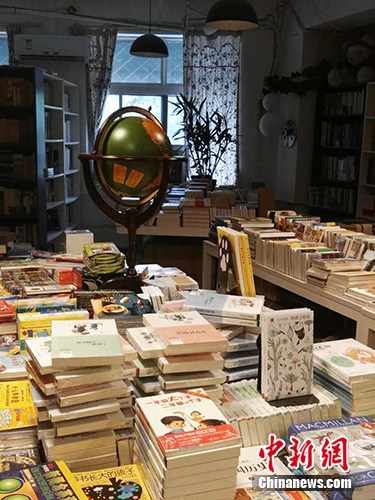 资料图:北京一家书店。<a target='_blank' data-cke-saved-href='http://www.chinanews.com/' href='http://www.chinanews.com/' >中新网</a>记者 宋宇晟 摄 点击进入下一页
