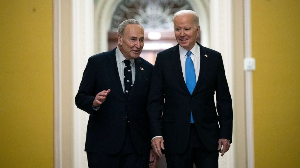 PHOTO: Senate Majority Leader Chuck Schumer walks with President Joe Biden as he arrives at the Capitol, March 2, 2023.
